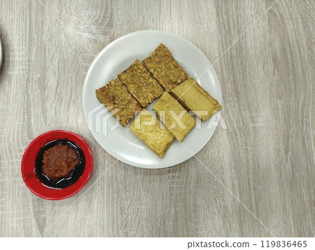 A plate of fried tempeh and tofu, a popular Indonesian dish. 119836465