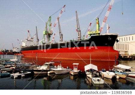 A cargo ship being outfitted at a shipyard in Imabari Hatohama A cargo ship being outfitted at a shipyard in Imabari Hatohama 119836569