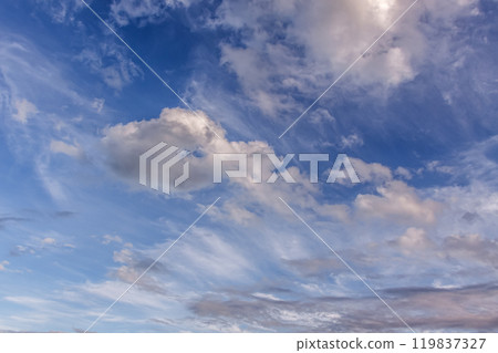 Clouds shining in the sun's oblique rays [Sunset scenery as background material] 119837327