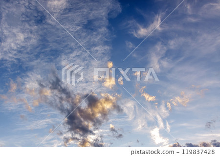 Clouds shining in the sun's oblique rays [Sunset scenery as background material] 119837428