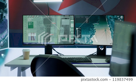 Armed forces military control center showing the North Korea flag, inflicting fear and propaganda among the population. Secret service spreading fake news for communism ideology. Camera A. 119837499