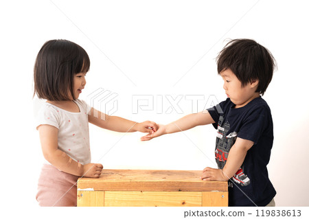 Two kindergarteners playing Two kindergarteners playing 119838613