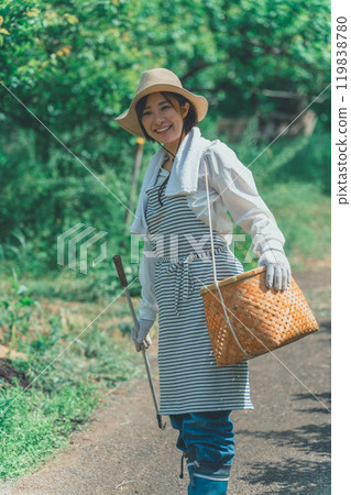 A floricultural farmer picking flowers 119838780