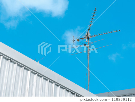 TV antenna on warehouse factory buildings with sky floor TV antenna on warehouse factory buildings with sky floor 119839112