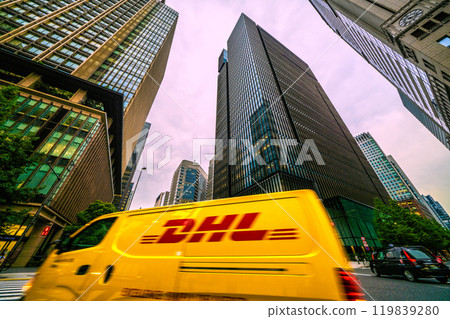 Tokyo cityscape in Japan. Crossing in front of Otemachi Station. DHL and taxis...Otemachi Tower is in front = November 1st 119839280