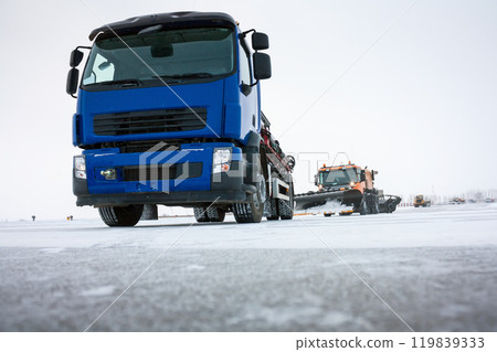 Machine for distribution of liquid anti-icing reagents on runway and snowplows cleans the airfield Machine for distribution of liquid anti-icing reagents on runway and snowplows cleans the airfield 119839333