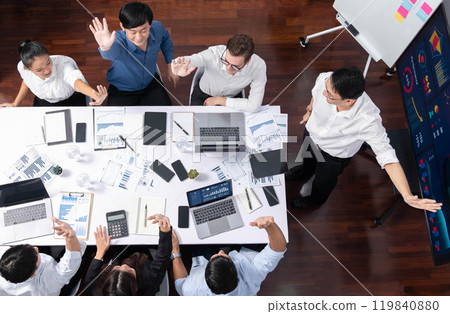 Group of diverse office worker join hand together in office. Prudent Group of diverse office worker join hand together in office. Prudent 119840880