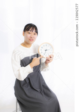 Young woman wearing a dress Young woman wearing a dress 119842577