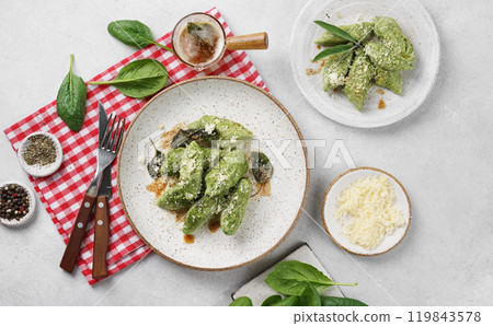 Ricotta and spinach gnocchi with butter with sage and parmesan, italian cuisine Casentino region. top view 119843578