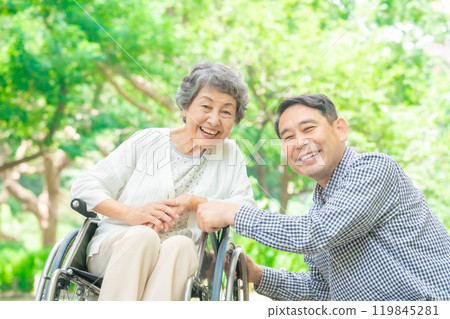 Senior woman, middle-aged man, parent and child, wheelchair Senior woman, middle-aged man, parent and child, wheelchair 119845281