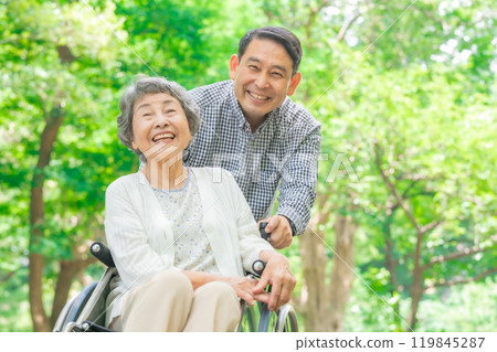 Senior woman, middle-aged man, parent and child, wheelchair Senior woman, middle-aged man, parent and child, wheelchair 119845287