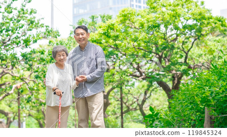 Senior woman, middle-aged man, parent and child walking Senior woman, middle-aged man, parent and child walking 119845324