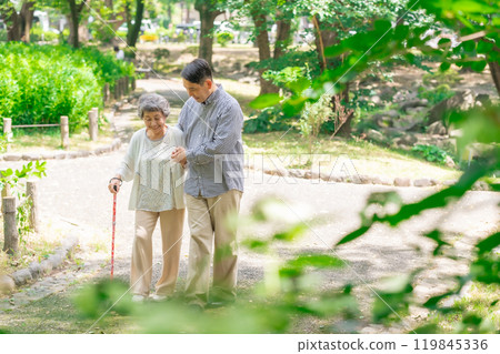 Senior woman, middle-aged man, parent and child walking 119845336