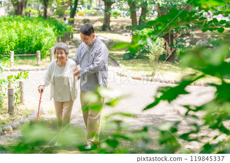 Senior woman, middle-aged man, parent and child walking 119845337