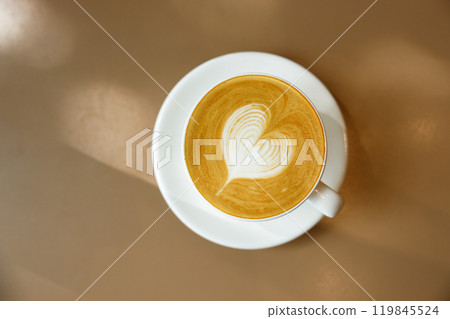 Cup of hot latte coffee on table Cup of hot latte coffee on table 119845524