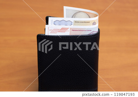 Yugoslav dinar in the black wallet 119847193