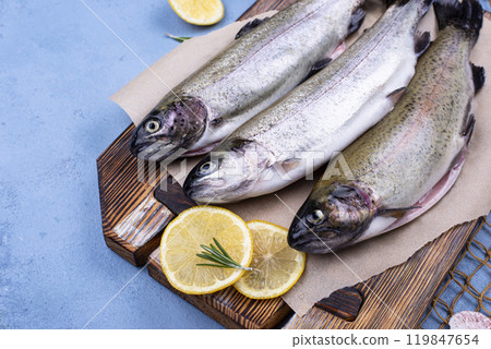 Raw uncooked trout with lemon Raw uncooked trout with lemon 119847654