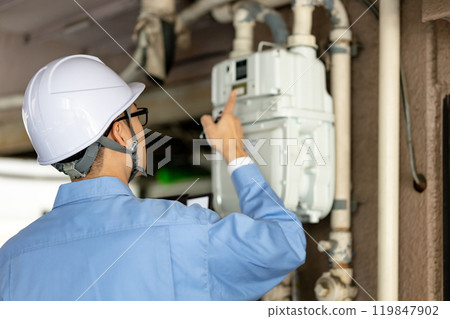 Workers inspecting Workers inspecting 119847902