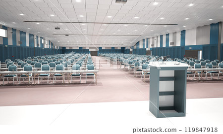 A spacious conference hall with rows of chairs and a podium 119847918