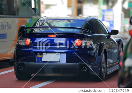 Image of a sports car running in the city Image of a sports car running in the city 119847929