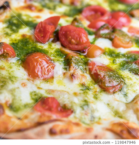 Italian pizza with cherry tomatoes Italian pizza with cherry tomatoes 119847946