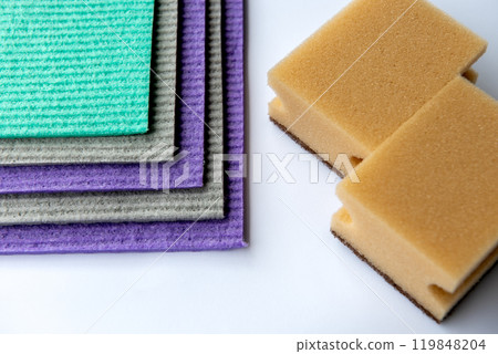 Colourful sponges with visible pores for scrubbing and cleaning. Colourful sponges with visible pores for scrubbing and cleaning. 119848204
