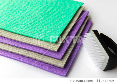 Colourful sponges with visible pores for scrubbing and cleaning. 119848206