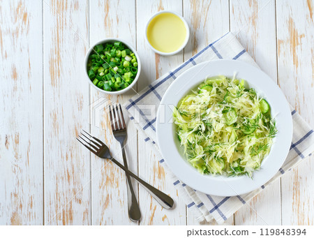 Spring vegan salad with cabbage, cucumber and dill. Top view, flat lay, overhead. 119848394