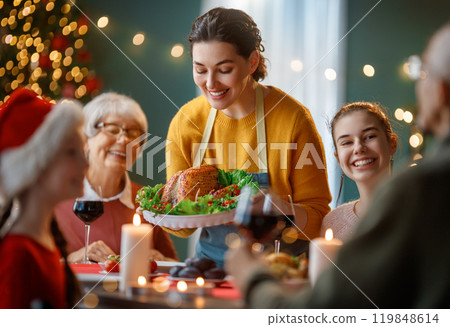 family celebrating Christmas family celebrating Christmas 119848614