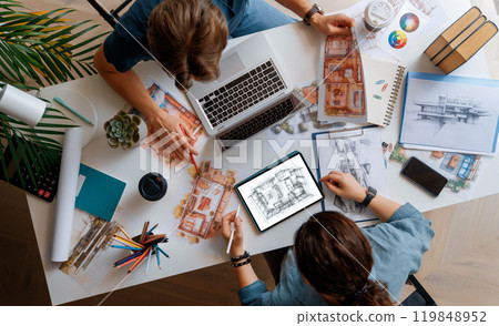 Designers working in studio Designers working in studio 119848952