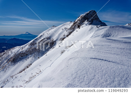 The Yatsugatake mountain range, Yokodake main peak and Mt. Fuji in severe winter The Yatsugatake mountain range, Yokodake main peak and Mt. Fuji in severe winter 119849293