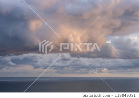 Dramatic sunset with a twilight blue color of the sky and clouds. 119849351