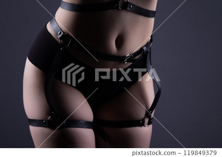 Photo of womans hips in bandage belt Photo of womans hips in bandage belt 119849379