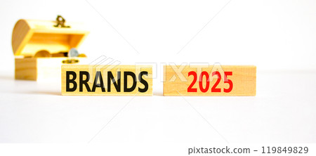 Planning brands 2025 new year symbol. Concept words Brands 2025 on beautiful wooden blocks. Beautiful white background. Wooden chest with coins. Business brands 2025 new year concept. Copy space. 119849829