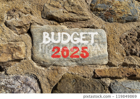 Planning budget 2025 new year symbol. Concept words Budget 2025 on beautiful grey stone. Beautiful big stone wall background. Business budget 2025 new year concept. Copy space. 119849869