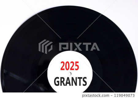 Planning 2025 grants new year symbol. Concept words 2025 Grants on beautiful white and black vinyl disk. Beautiful white background. Business 2025 grants new year concept. Copy space. 119849873