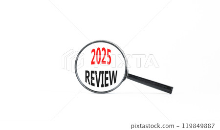 Planning 2025 review new year symbol. Concept words 2025 Review on beautiful white paper in magnifying glass. Beautiful white paper background. Business 2025 review new year concept. Copy space. 119849887