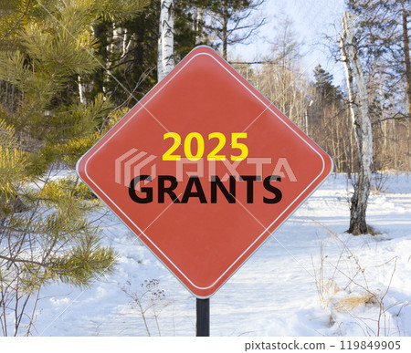 Planning 2025 grants new year symbol. Concept words 2025 Grants on beautiful red road sign. Beautiful winter forest background. Business 2025 grants new year concept. Copy space. Planning 2025 grants new year symbol. Concept words 2025 Grants on beautiful red road sign. Beautiful winter forest background. Business 2025 grants new year concept. Copy space. 119849905
