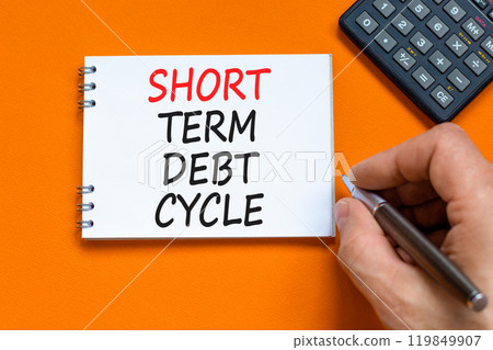 Short term debt cycle symbol. Concept words Short term debt cycle on beautiful white note. Beautiful orange background. Businessman hand. Calculator. Business Short term debt cycle concept. Copy space Short term debt cycle symbol. Concept words Short term debt cycle on beautiful white note. Beautiful orange background. Businessman hand. Calculator. Business Short term debt cycle concept. Copy space 119849907