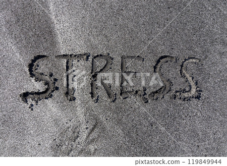 lifestyle and stress concept. Concept word Stress written on beautiful ocean sand beach. Beautiful ocean sand beach background, copy space. Medical and psychology stress concept. 119849944