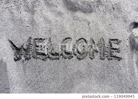 Business hello and welcome concept. Concept word Welcome written on beautiful ocean sand beach. Beautiful ocean sand beach background, copy space. Business hello and welcome concept. 119849945