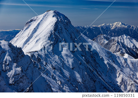 Winter view of Mt. Akadake and Mt. Kitadake in the Southern Alps from Mt. Yokodake in the Yatsugatake Mountain Range Winter view of Mt. Akadake and Mt. Kitadake in the Southern Alps from Mt. Yokodake in the Yatsugatake Mountain Range 119850331