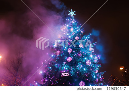 Vibrant holiday tree with lights & decor 119850847