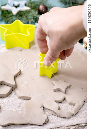 Carving Christmas toys out of clay 119850896