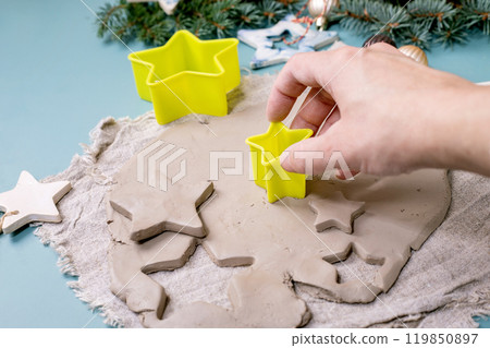 Carving Christmas toys out of clay Carving Christmas toys out of clay 119850897