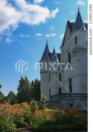 White castle in Estonia. Alatskivi Castle. Fairytale white castle with blue roof White castle in Estonia. Alatskivi Castle. Fairytale white castle with blue roof 119851948