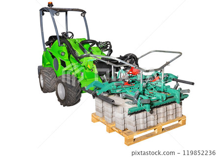 Powerful loader lifting heavy concrete blocks with industrial machine on pallet. Isolated white background. Construction equipment concept. 119852236