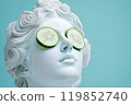 Statue of a Greek goddess with cucumber slices on eyes. Sculpture on spa treatments after bath. Beauty procedures, self-care, art, wellness, cosmetics and beauty salon, relaxation concept 119852740