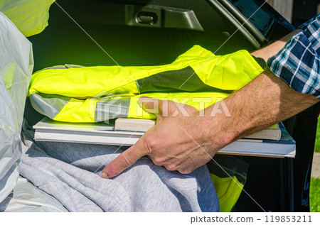Taking stuff from car trunk. High quality photo Taking stuff from car trunk. High quality photo 119853211