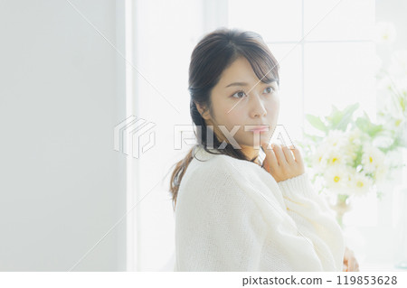 Woman in white knit Woman in white knit 119853628